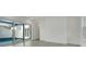 Spacious living room with pool access and sliding glass doors at 3016 Kensington Ave, Davenport, FL 33837