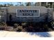 Andover Ridge community sign displayed on a decorative stone entrance with manicured landscaping and stone accents at 1697 Andover Ridge Dr, Deland, FL 32720