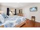 Bright bedroom with a king-size bed and private balcony at 248 Miramar Ave, Davenport, FL 33897