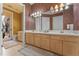 Bathroom with double vanity, toilet and access to a courtyard at 800 W 2Nd Ave, Windermere, FL 34786