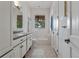 Shared bathroom with double vanity and tub shower combo at 800 W 2Nd Ave, Windermere, FL 34786