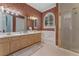Elegant bathroom with double vanity, soaking tub, and separate shower at 800 W 2Nd Ave, Windermere, FL 34786