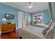 Bedroom with two twin beds, a dresser, and access to a balcony at 800 W 2Nd Ave, Windermere, FL 34786