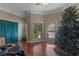 Spacious bedroom with hardwood floors, large windows, and ample closet space at 800 W 2Nd Ave, Windermere, FL 34786