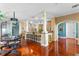 Open concept dining area with hardwood floors and kitchen view at 800 W 2Nd Ave, Windermere, FL 34786