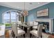 Spacious dining room with lake views and chandelier at 800 W 2Nd Ave, Windermere, FL 34786