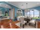 Bright dining room with lake views and a chandelier at 800 W 2Nd Ave, Windermere, FL 34786