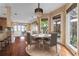 Bright dining area with hardwood floors and access to a patio at 800 W 2Nd Ave, Windermere, FL 34786