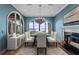 Elegant dining room with a fireplace and lake views at 800 W 2Nd Ave, Windermere, FL 34786