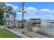 Private wooden dock with gazebo and boat slips at 800 W 2Nd Ave, Windermere, FL 34786