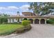 Elegant home with three-car garage and manicured lawn at 800 W 2Nd Ave, Windermere, FL 34786