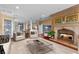 Spacious living room features a fireplace and ample natural light at 800 W 2Nd Ave, Windermere, FL 34786