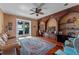 Spacious office with built-in shelving, hardwood floors, and lake views at 800 W 2Nd Ave, Windermere, FL 34786