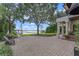 Spacious brick patio with lake view and seating area at 800 W 2Nd Ave, Windermere, FL 34786
