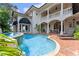Luxury pool with spa and spacious patio area at 800 W 2Nd Ave, Windermere, FL 34786