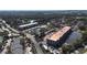 Extensive aerial view showcasing the community's layout, including residential buildings, lakes and amenities at 4424 S Texas Ave, Orlando, FL 32839