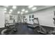 Community gym with windows, weights, bikes, and treadmill at 4424 S Texas Ave, Orlando, FL 32839