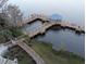 Community dock with gazebo offering scenic waterfront views at 13427 Blue Heron Beach Dr # 702, Orlando, FL 32821