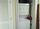 Stackable washer and dryer in a closet at 13427 Blue Heron Beach Dr # 702, Orlando, FL 32821
