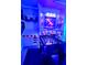 Themed game room featuring custom Star Wars decor, a basketball game, and a foosball table, all lit with blue lights at 3001 Sunset Vista Blvd, Kissimmee, FL 34747