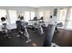 Bright community gym featuring multiple treadmills, elliptical machines, and exercise bikes for residents at 1507 Tranquil Ave, Clermont, FL 34714