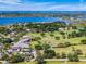 Aerial view highlighting the golf course community and lakefront homes at 6254 Masters Blvd # D106, Orlando, FL 32819
