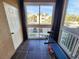 Inviting balcony space offering exercise equipment and views of the surrounding neighborhood at 4865 Cypress Woods Dr # 2204, Orlando, FL 32811