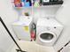 Compact laundry area featuring a washing machine and dryer for added convenience at 4865 Cypress Woods Dr # 2204, Orlando, FL 32811