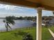 Spacious backyard with well-maintained lawn and lake view at 10843 Lakeshore Dr, Clermont, FL 34711