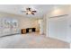 Comfortable bedroom with carpet, closet and ceiling fan at 10843 Lakeshore Dr, Clermont, FL 34711