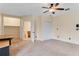 Neutral bedroom with an ensuite bathroom and ample closet space at 10843 Lakeshore Dr, Clermont, FL 34711
