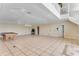 Spacious game room with a pool table, recessed lighting and access to the upper level at 10843 Lakeshore Dr, Clermont, FL 34711