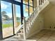 Staircase with natural light and a view of the outdoors at 10843 Lakeshore Dr, Clermont, FL 34711