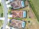 Aerial view of a house with a pool and a large backyard at 6078 Broad Oak Dr, Davenport, FL 33837