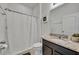 Clean bathroom with shower, toilet and granite vanity at 6078 Broad Oak Dr, Davenport, FL 33837
