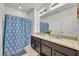 Bathroom with double sinks and granite countertop at 6078 Broad Oak Dr, Davenport, FL 33837