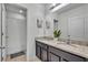 Bathroom with double vanity and shower at 6078 Broad Oak Dr, Davenport, FL 33837