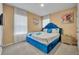 Bedroom with a large bed and plenty of natural light at 6078 Broad Oak Dr, Davenport, FL 33837