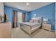 Comfortable bedroom with a king-size bed and neutral decor at 6078 Broad Oak Dr, Davenport, FL 33837