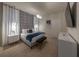 Cozy main bedroom features elegant décor, soft lighting, and a serene ambiance at 4189 Lana Ave, Davenport, FL 33897