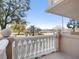 An elegant balcony offers stunning views of the water and trees, perfect for relaxation at 1110 W Ivanhoe Blvd # 6, Orlando, FL 32804