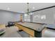 Relaxing billiards room features a classic pool table and ambient lighting, perfect for entertainment at 1110 W Ivanhoe Blvd # 6, Orlando, FL 32804