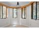 A neutral toned dining room with natural light, and travertine tile at 1110 W Ivanhoe Blvd # 6, Orlando, FL 32804