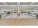 Spacious grand foyer with marble staircase, complemented by lush greenery and elegant design at 1110 W Ivanhoe Blvd # 6, Orlando, FL 32804