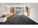 Open concept living room, with views to the kitchen, and a large window at 1110 W Ivanhoe Blvd # 6, Orlando, FL 32804