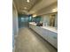 Bathroom featuring a tiled shower and double vanity at 3219 Legends Preserve Dr, Daytona Beach, FL 32124