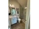 Modern bathroom with a glass-enclosed shower, vanity sink, and stylish fixtures at 3219 Legends Preserve Dr, Daytona Beach, FL 32124
