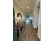 Welcoming foyer with elegant tile flooring, a decorative table, and an open view of the living area at 3219 Legends Preserve Dr, Daytona Beach, FL 32124
