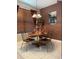 Cozy dining area with decorative lighting, a round table, and comfortable seating for four at 466 Pepin Dr, Orlando, FL 32825