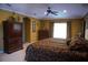 Spacious main bedroom features dark wood furniture, neutral walls, and natural light at 466 Pepin Dr, Orlando, FL 32825